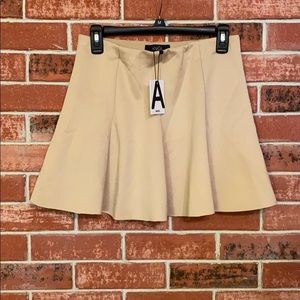 “ANGL” flowy, BRAND NEW, mid thigh skirt